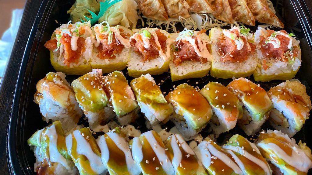 Sushi Family Set · Bakersfield 8pcs, Rock & Roll 8pcs
Yellow Submarine 6pcs, Gyoza 6pcs
Miso Soup 2, Large Salad 1