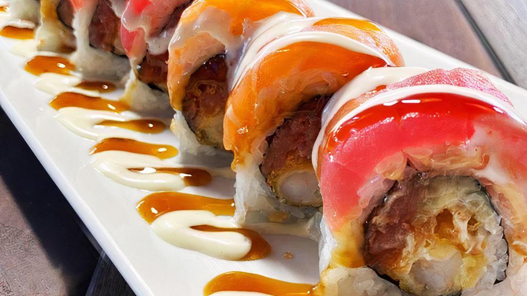 Hawaiian Roll · In: spicy tuna, shrimp tempura out: fresh tuna & salmon, teriyaki & wasabi sauce.