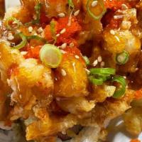 The Miyoshi (Craw Fish / Pop Corn Baby Lobster) · In: shrimp tempura, crab, avocado, cucumber roll topped w/ fried crawfish, teriyaki, green o...