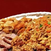 Familia Feast · Includes 1 Tray of Meat, 1 Tray of Rice, 1 Tray of Beans, Onions, Cilantro, and Tortillas. (...