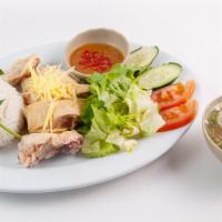 Com Ga Hap (Steamed Chicken) · Free range steamed chopped chicken, serve with rice, mixed salad, and soup. Comes with white...