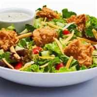 Crispy Chicken Salad · Crispy lettuce, red onion, celery, topped with cheese and crispy chicken and dressing on side.
