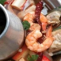 Tom Yum Seafood · Spicy and sour soup with seafood