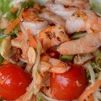 Papaya Salad With Shrimp · Papaya salad topped with grilled shrimp