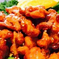 Orange Chicken · Lightly battered deep fried chicken breast or tofu with tangy fresh orange glaze