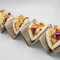 Chicka Bow Wow (5) · 5 mini bao buns with nashville chicken, coleslaw, and comeback sauce