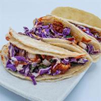 Triple Threat (3 Nashville Tacos) · 3 Nashville street tacos with corn tortilla, chopped tenders, onion, red cabbages, comeback ...