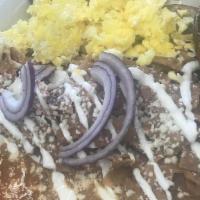 Chilaquiles Con Huevos · Eggs chilaquiles.