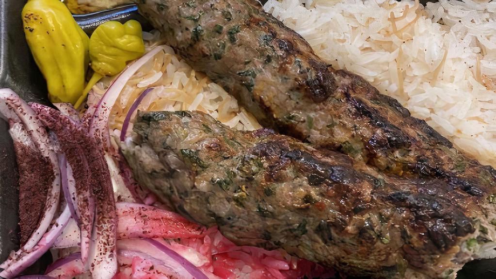 Lamb Lule · Served with rice pilaf, choice of two sides, pickled turnips, and pita bread.