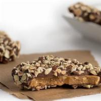 Milk Chocolate English Toffee · 1 lb. (8 pieces) of crisp, buttery toffee enrobed in milk  chocolate, covered with roasted a...