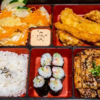 Bento A · Chicken teriyaki, fried seafood (tempura salmon, shrimp imitation crab stick), cali maki, gy...