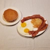 Pancake Combo Breakfast · Choice of Ham, Bacon, or  Sausage, Serve with 2 Eggs, Hash Brown Potatoes and Buttermilk Pan...