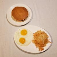 Corkwood Breakfast · 2 Eggs, Hash Brown Potatoes, and Buttermilk Pancakes or Toast.