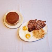 Pork Chops And Eggs · Served with 2 eggs,  hash brown potatoes, and Toast or  Buttermilk Pancakes.