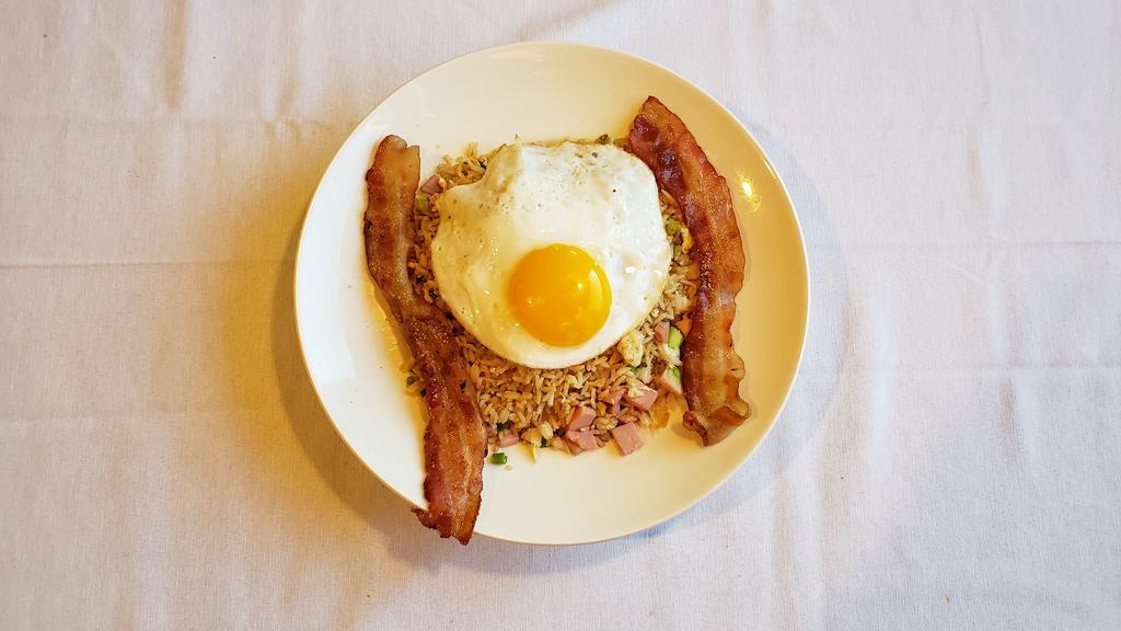 Senior/ Child Fried Rice Combo Breakfast  · 1 Egg, 2 Strips of Bacon or Sausage and Fried Rice