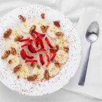 Hot Cereal · Oats and honey, bananas, strawberries, candied walnuts, and cinnamon powder.
