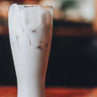 Iced Chai Latte · Refreshing infusion that consists of spiced chai tea and milk served over ice.