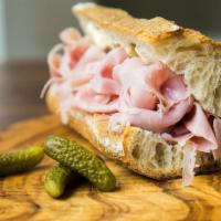 Ham Sandwich · Class ham sandwich with pickles and mustard.