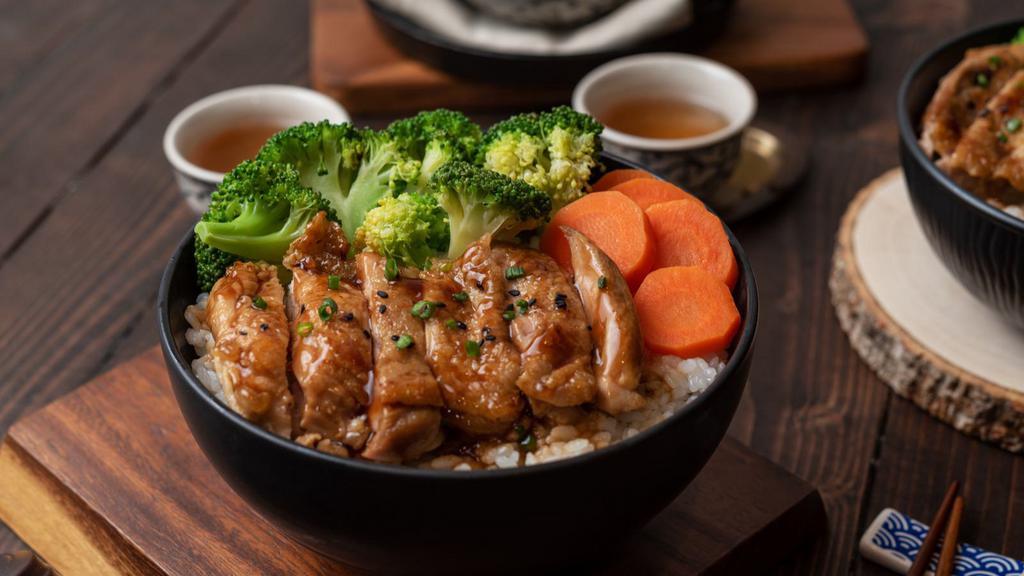 Teriyaki Bowl · Steamed rice, cabbage, carrots, broccoli, teriyaki sauce with your choice of meat.