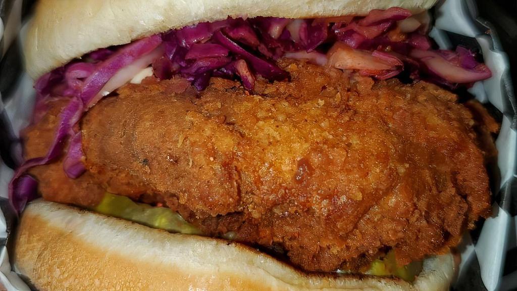 Nashville Hot Chick Sando · 100% Plant Based Fried Chick'n sandwich served with our homemade coleslaw, pickles, secret sauce and seasoned with Nashville Hot Seasoning.