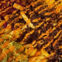 Loaded Fries · Large plate of fries topped with Impossible meat, house specialty coleslaw, guac, cheese sau...