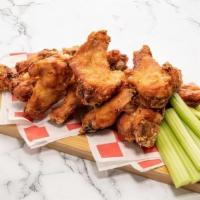 Jumbo Wings (20-Pc Party Pack) · 20 crisp fried golden-brown wings tossed in the sauce of your choice.