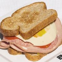 Italian · A sandwich composed of thin slices of seasoned mortadella, capocollo, and salami on a long F...