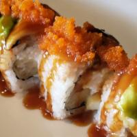 Dragon Roll · Eight pieces. Shrimp tempura, crab salad, cucumber, unagi, avocado, and masago on top with u...
