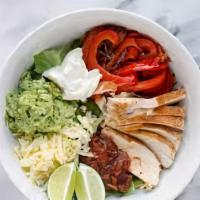 Fajita Salad · Your choice of steak or chicken served on romaine lettuce with sautéed veggies and one of ou...
