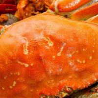 Dungeness Crab - Live · Served whole. Each crab weighs approximately 2 - 3 lbs. Prices may vary from an in-store pur...