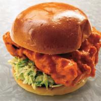 The Stinger · Our classic fried chicken with Buffalo sauce and blue cheese dressed greens.