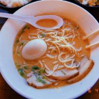 Spicy Tonkotsu Ramen · Pork broth with noodles. Comes with dry seaweed, green onions, and bean sprouts.