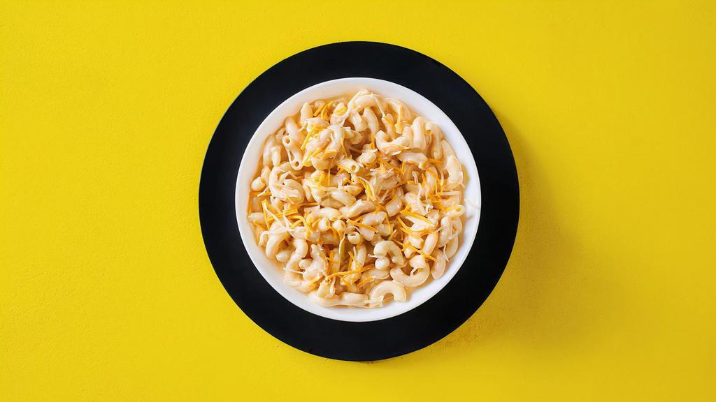 Mac & Yellow · Snack portion of our creamy, cheesy, oozy mac & cheese, topped with shredded cheese