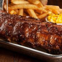 Full Rack Fall-Off-The-Bone Ribs · Our famous baby back ribs
are slow-cooked in-house for
maximum flavor
