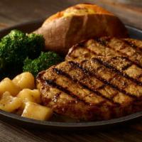 Mesquite-Grilled Pork Chop · One bone-in 10 oz. pork chop
served with cinnamon apples.