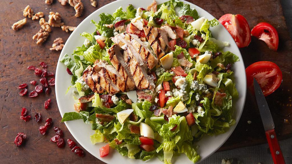 Anything & Everything Salad · Romaine lettuce, chopped bacon, walnuts dried cranberries, bleu cheese crumbles, diced tomatoes and hard-boiled egg.