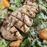 Caesar Salad · A bed of crisp romaine lettuce tossed in
creamy Caesar dressing.