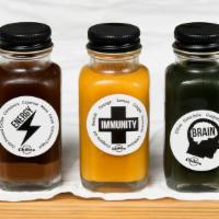 Immunity Surge · Lemon, Orange, Ginger, & Turmeric Juice, Baobab, Oregano Oil & Cayenne Pepper