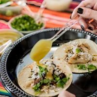 Family Pack For 15 · Serves three tacos per person. Family packs include: chips, red and green salsas, black bean...