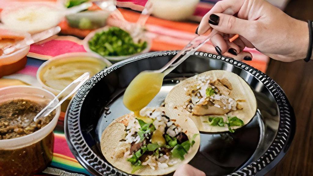 Family Pack For 15 · Serves three tacos per person. Family packs include: chips, red and green salsas, black beans, brown rice, and pineapple with tajin, choice of three proteins: pork belly, steak, braised short rib, drunken chicken, pork al pastor, or roasted cauliflower.