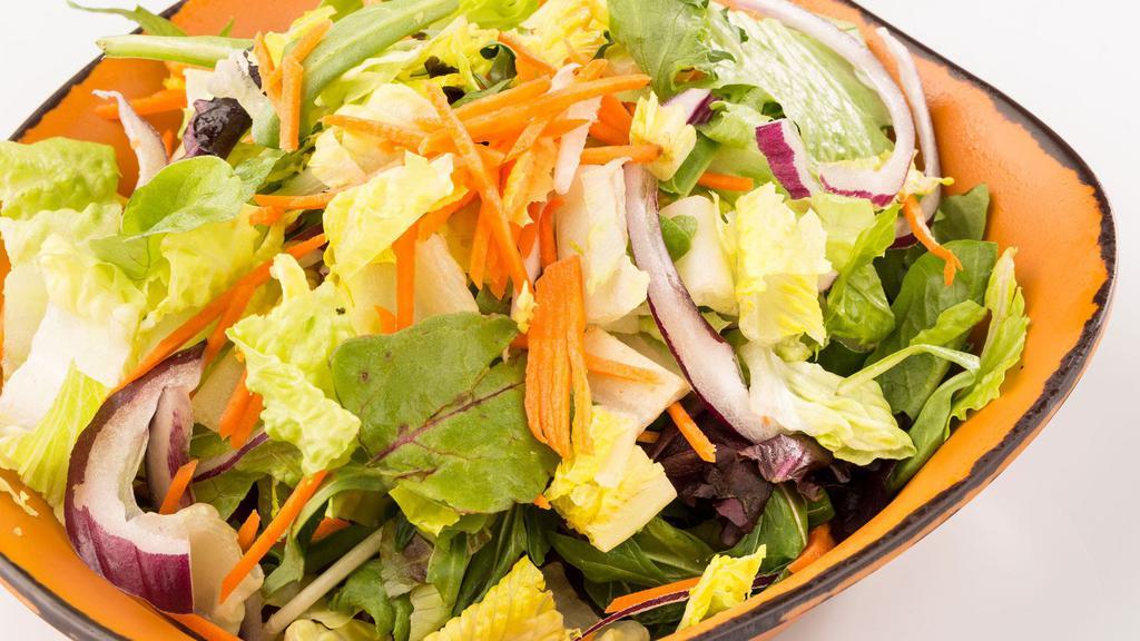 House Salad · Carrots, red onions, honey lime cilantro vinaigrette