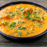 Chicken Tikka Masala · Chicken breast cooked with onions and tomato gravy.