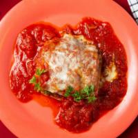 Lasagna · Homemade beef and pork lasagna, layered with spinach, ricotta cheese, and topped with mozzar...