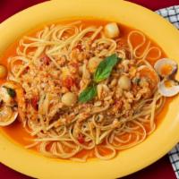 Linguine Di Mare · Prepared with shrimp, scallops, calamari, clams, and a fresh tomato sauce.