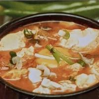 Soondooboo Chigae · Spicy Tofu Stew .
Side dishes and one rice included.