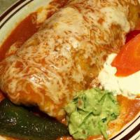 Chimichanga Burrito · Fried burrito, choice of meat, rice, beans, onion, cilantro and salsa with guacamole and sou...