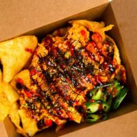 Fire Poke Nachos · Spicy. Spicy tuna and kama crab with sriracha and green onions over wonton chips. Specify on...