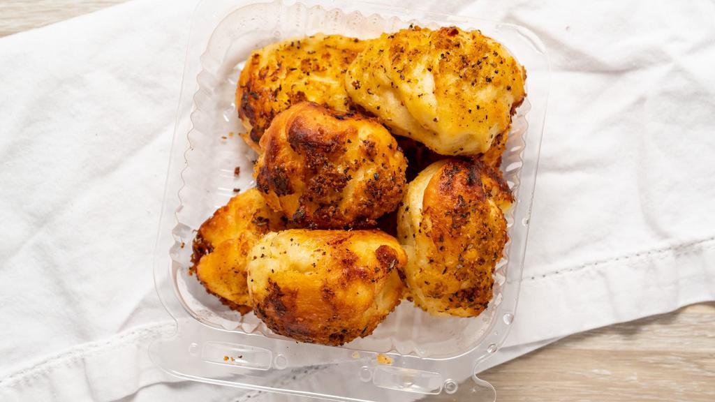 Garlic Bread Bites · Buttery bread that is topped with garlic.