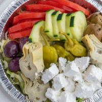 Greek Salad · Shredded lettuce topped with feta cheese, sliced tomatoes, marinated artichoke hearts, cucum...
