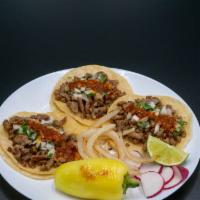 Los Tacos · Asada, chorizo or chicken, onions, cilantro and salsa.
